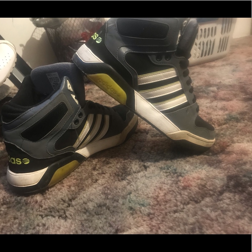 White-black Adidas high tops size 7.5 men. 9 woman